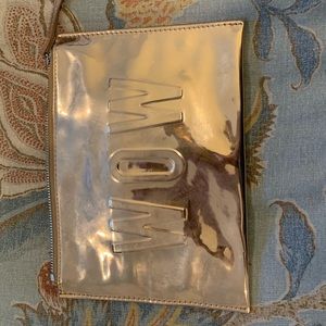 Stella and Dot Rose Gold wristlet.